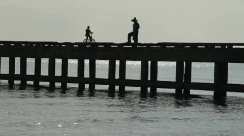 Fishing off pier Stock Footage 10764711
