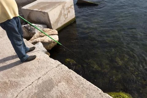 Fishing in the pier Stock Photos