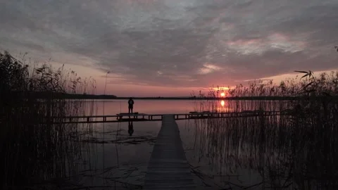 Fishing on the Pier at Sunset Stock Footage 256666912