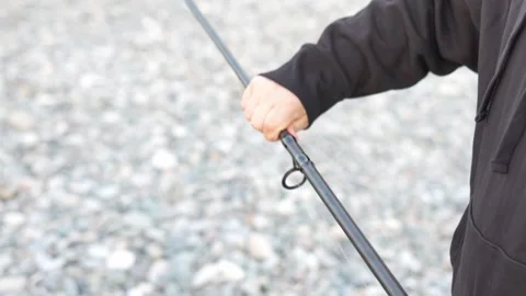 Fishing Preparation  – Close-Up of Hands Hooking Worm on Line Before Casting Video stock 323373120