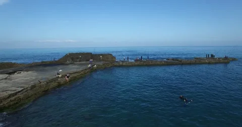 Fishing on the reef Stock Footage 64122908