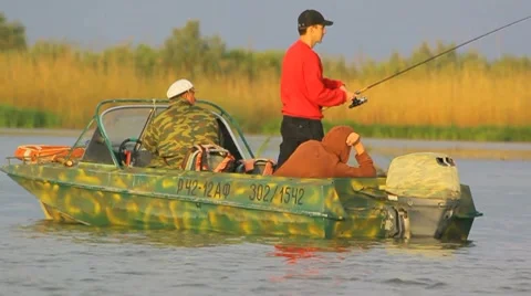 Fishing at the river from the boat Stock Footage 8762779