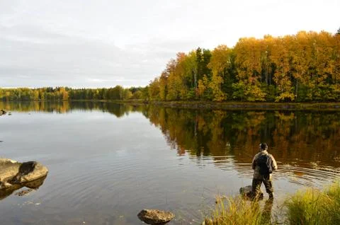 Fishing in river Stock Photos