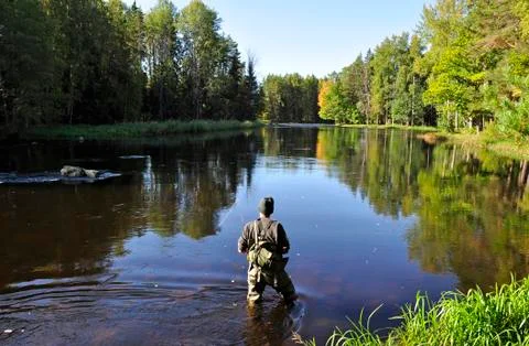 Fishing in river Stock Photos