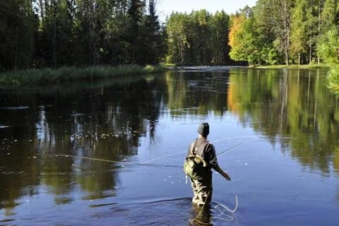 Fishing in river Stock Photos