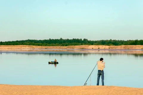 Fishing on a river Stock Photos