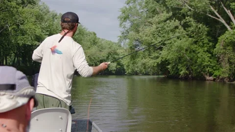 Fishing on a river in the woods Stock Footage 137535602