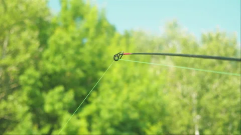 Fishing rod bending by the bite of the fish. Feeder fishing. Bite alarm. Stock Footage 244473383
