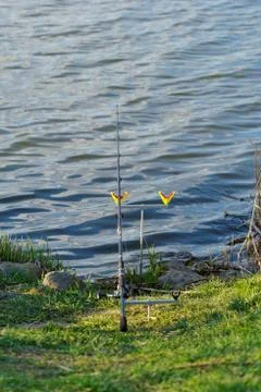 Fishing rod on rack Stock Photos