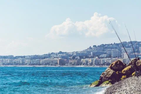 Fishing rods at a beach in spring Stock Photos