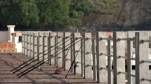 Fishing rods on the pier Stock Footage 122248880