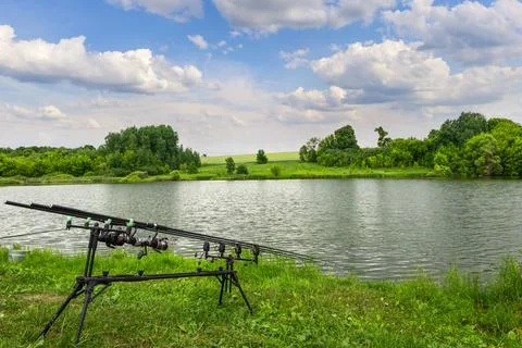 Fishing rods on pole Stock Photos
