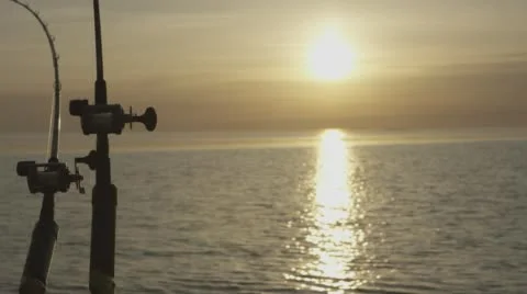 Fishing rods sunset Stock Footage 62691669