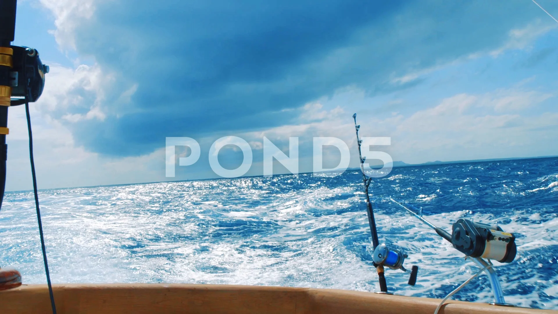 Fishing rods trolling in tumultuous Cari, Stock Video