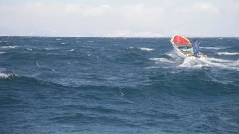 Fishing rubber boat jumping on waves. 20160131091636 185 1 Stock Footage 130356426