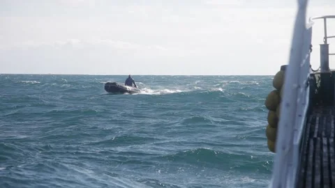 Fishing rubber boat jumping on waves. 20160131091816 195 1 Stock Footage 130356435