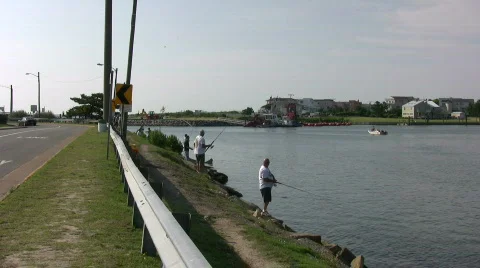 Fishing in Rudee inlet Stock Footage 457360