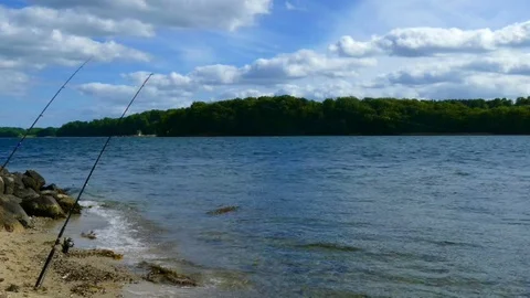 Fishing by the sea Stock Footage 76474802