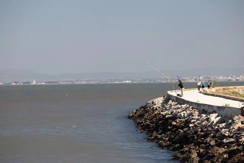 Fishing on the seaside Stock Photos
