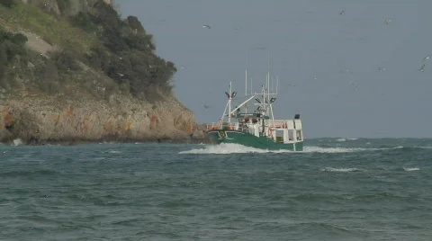 Fishing ship near the cliffs Video stock 794624