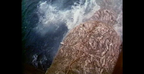 Fishing Ship Pulling in Large Net at Sea – Australia (1984) Stock Footage 310438432