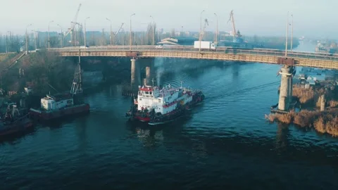 Fishing ship sailing on the river at dawn. Professional fishing vessel close-up Stock Footage 156239398