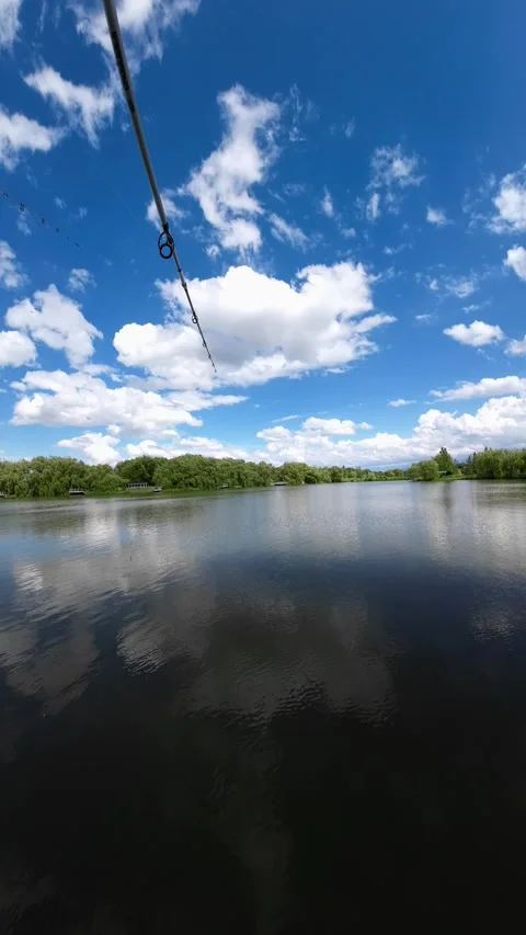 Fishing on a small lake Stockbeeldmateriaal 197829723