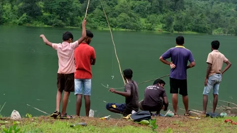 Fishing at Solanpada Dam Stock Footage 141128386