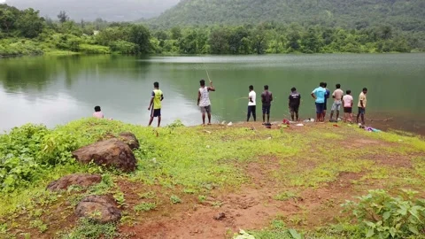 Fishing at Solanpada Dam Stock Footage 141129916