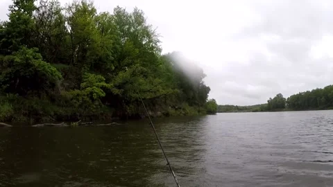 Fishing with spinning on pakraft 스톡 동영상 131458073