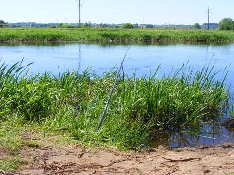 Fishing on the summer river Stock Photos