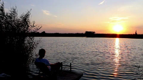 Fishing sunset catch Stock Footage 31824684