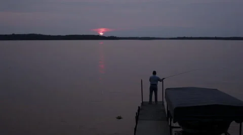 Fishing at sunset Video stock 34598783