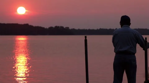 Fishing at sunset Video stock 34696006