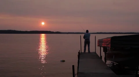 Fishing at sunset Video stock 34778206