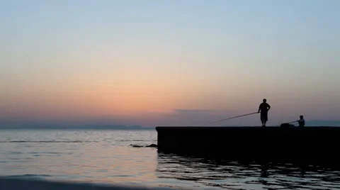 Fishing at Sunset Stock Footage 35594543