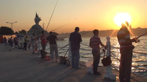Fishing in Sunset Stock Footage 46260031