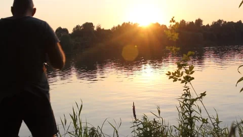 Fishing on sunset. Stock Footage 136021533