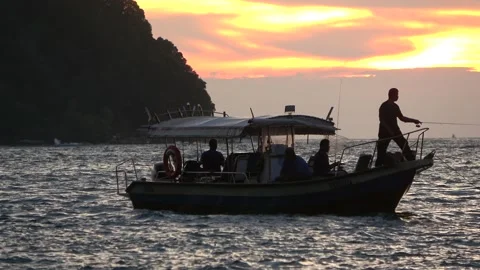 Fishing at sunset, Malaysia Video stock 185464219