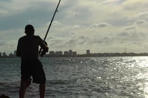 Fishing in the Sunset Stock Photos