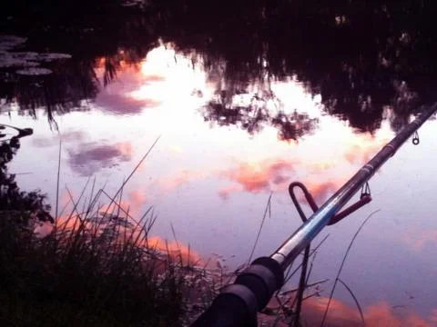 Fishing sunset Foto stock