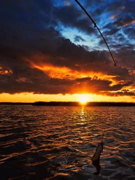 Fishing at sunset Stock-Fotos