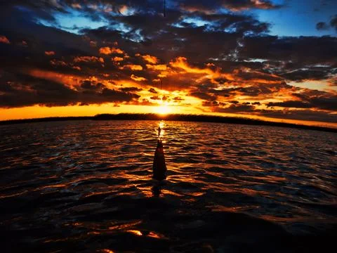 Fishing at sunset Foto stock