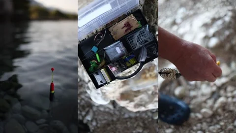 Fishing tackle preparation with float feeder rig hooks and lures by water Video stock 341622919