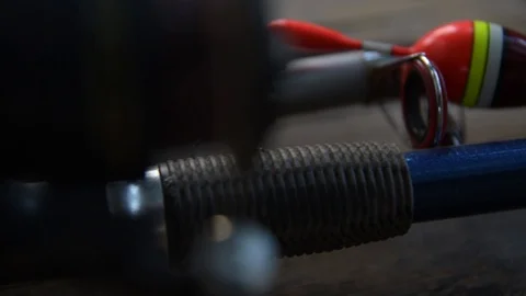 Fishing tackle, rod, hook and float close-up Stock Footage 128409865