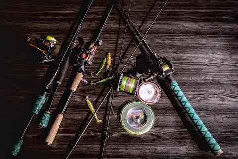 Fishing tackle spinning rods and casting   background. Stock Photos