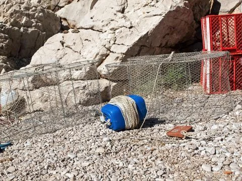 Fishing trap on the beach Stock Photos