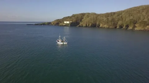 Fishing Trawler Pulls in Lobster Pots off Cornish Coast Stock Footage 59785177