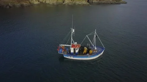 Fishing Trawler Pulls in Lobster Pots off Cornish Coast Stock Footage 59786159