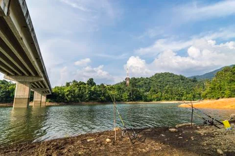 Fishing under the bridge Stock Photos